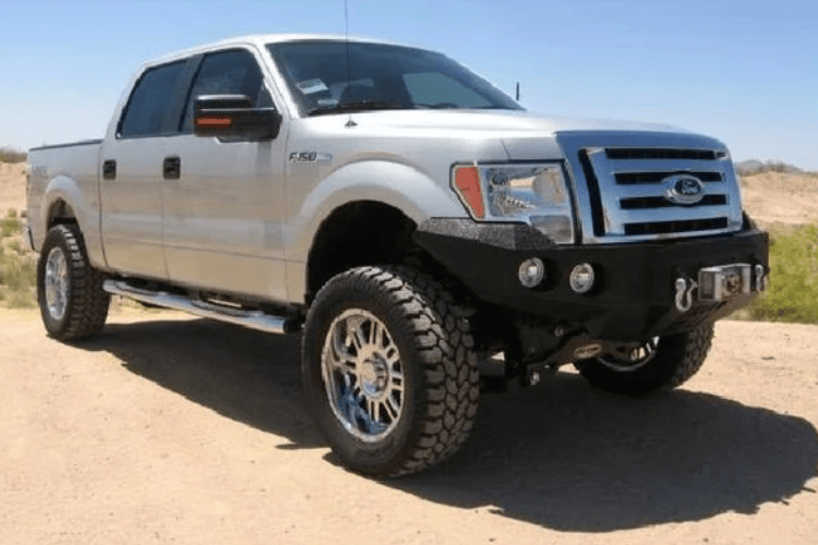 Truck front bumper #15 from Iron Bull gives a 2009-2014 Ford F150 an imposing off-road stance on rough terrain