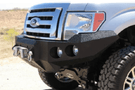 Truck front bumper #15 from Iron Bull gives a 2009-2014 Ford F150 an imposing off-road stance on rough terrain