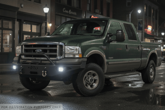 Night Raider Kit installed on a 2004 Ford F250 Super Duty built for the dark trails featuring Fab Fours front and rear bumpers and Rigid lights