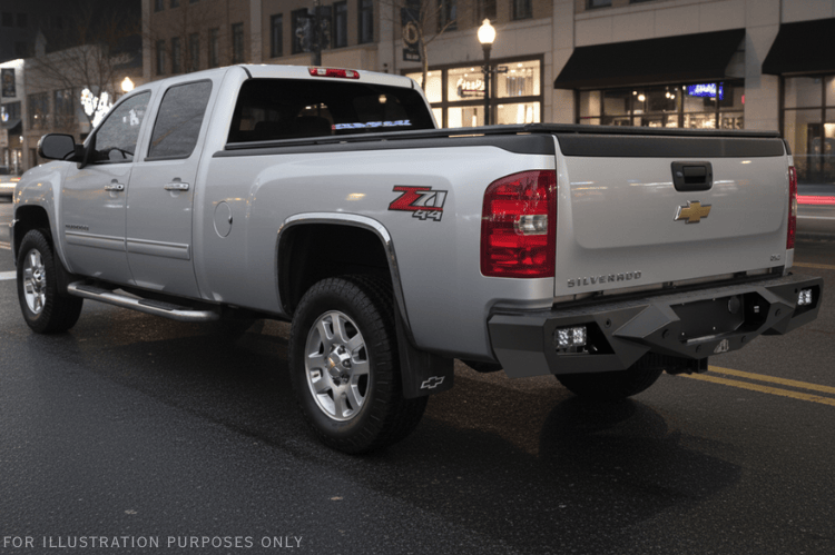 Night Raider Kit installed on a 2014 Silverado 2500HD to turn the truck into a night beast with heavy-duty Fab Fours bumpers and Rigid LED lighting