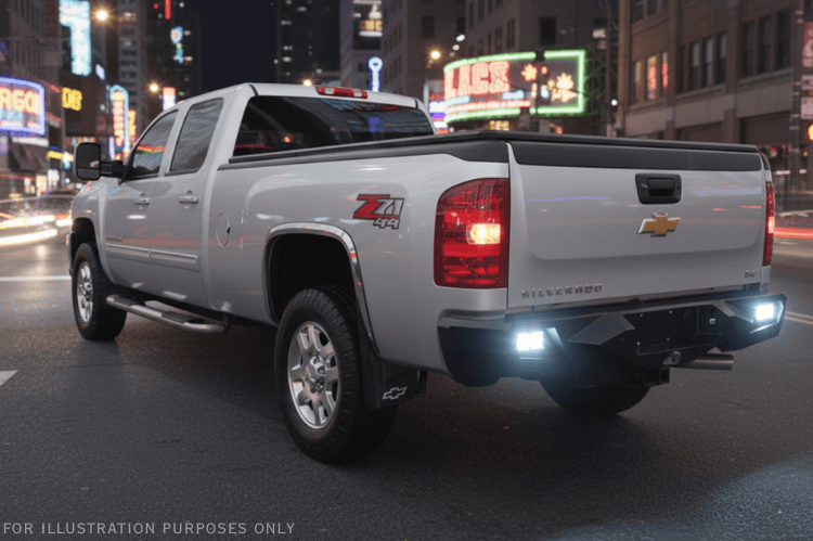 Night Raider Kit installed on a 2014 Silverado 2500HD to turn the truck into a night beast with heavy-duty Fab Fours bumpers and Rigid LED lighting