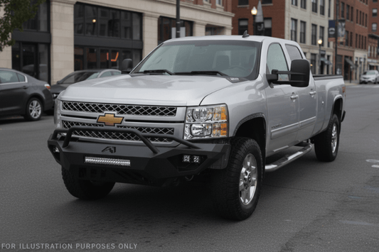 Night Raider Kit installed on a 2014 Silverado 2500HD to turn the truck into a night beast with heavy-duty Fab Fours bumpers and Rigid LED lighting