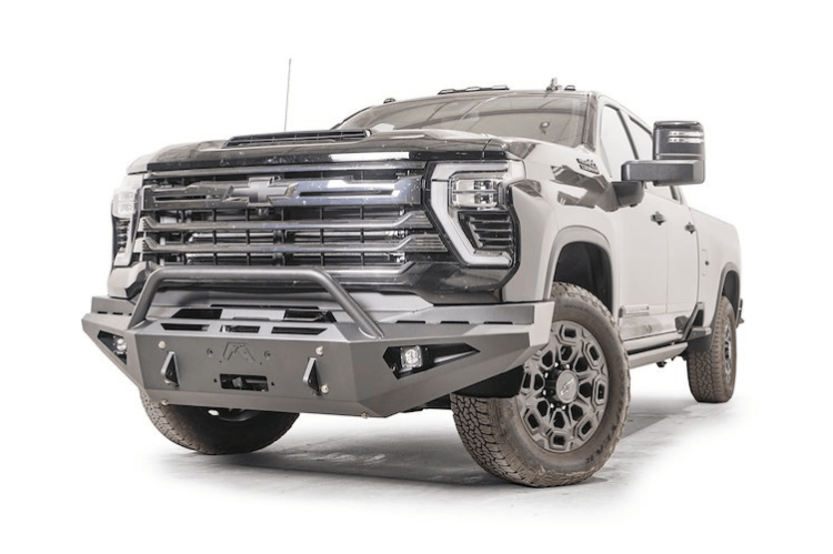Adventure-ready 2025 Chevy Silverado 2500HD with Night Raider Kit featuring Fab Fours bumpers and Rigid lights