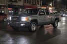 Custom 2007 GMC Sierra 2500HD build featuring Night Raider Kit with Hammerhead protection and Rigid LED lighting