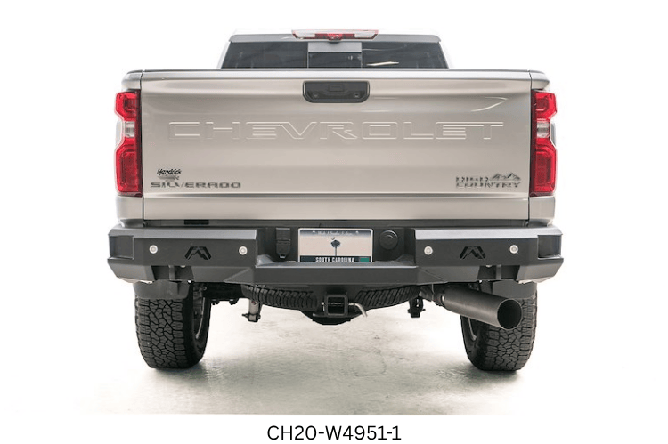 Night Raider Kit installed on a 2023 GMC Sierra 2500HD with heavy-duty Fab Fours bumpers and Rigid LED light bars