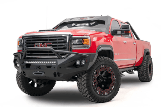 Night Raider Kit installed on a 2023 GMC Sierra 2500HD with heavy-duty Fab Fours bumpers and Rigid LED light bars