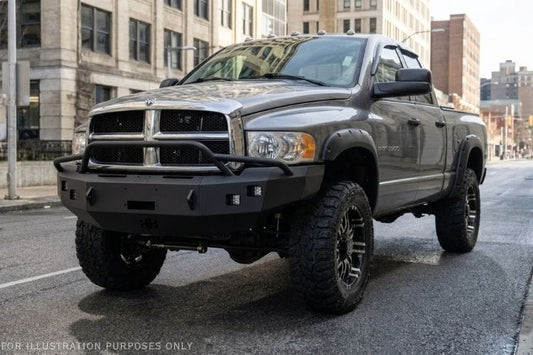 2005 Dodge Ram 2500 Bumper Night Raider kit featuring Hammerhead Bumpers and Rigid lights for rugged truck protection