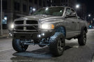 2005 Dodge Ram 2500 Bumper Night Raider kit featuring Hammerhead Bumpers and Rigid lights for rugged truck protection