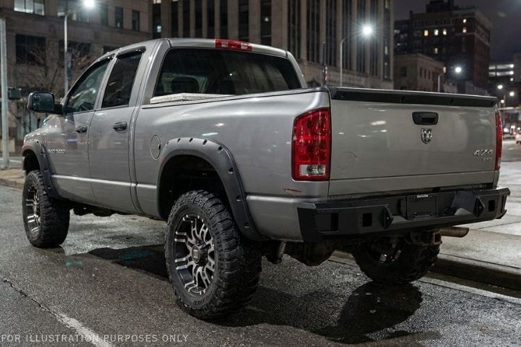 2005 Dodge Ram 2500 Bumper Night Raider kit featuring Hammerhead Bumpers and Rigid lights for rugged truck protection