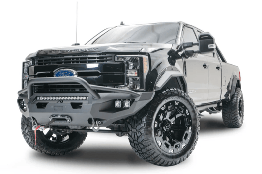 Customized 2016 Ford F250 Super Duty equipped with Fab Fours bumpers and Rigid light setup