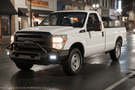 Customized 2016 Ford F250 Super Duty equipped with Fab Fours bumpers and Rigid light setup