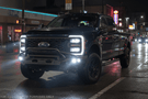 Custom 2023 Ford F250 Night Raider build featuring Fab Fours armor and Rigid lighting package