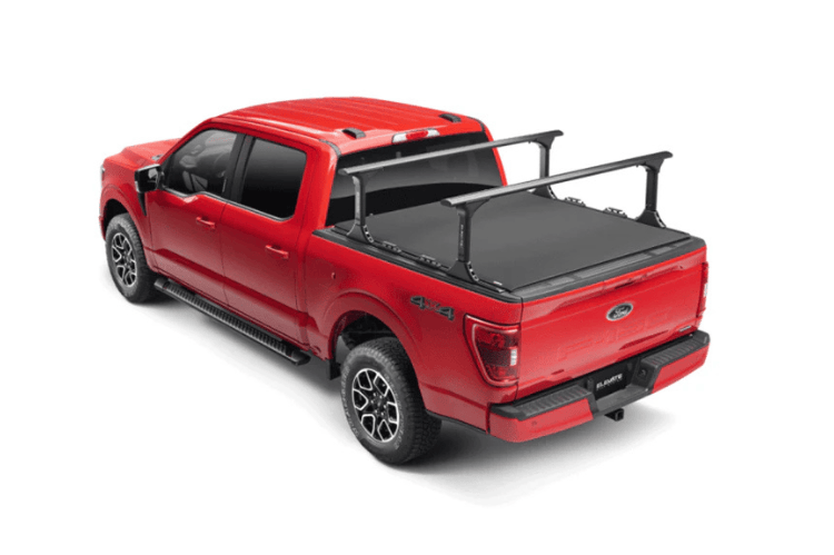 Overland Adventure Kit for a 2004 Ford F250, optimized for heavy-duty service with Hammerhead bumpers, Warn winch and Truxedo rack.