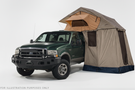 Overland Adventure Kit for a 2004 Ford F250, optimized for heavy-duty service with Hammerhead bumpers, Warn winch, Truxedo rack and ARB roof tent.