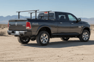 Overland Adventure Kit for a 2018 Dodge Ram 2500, built to thrive under pressure with Fab Fours bumpers, Warn winch, Truxedo rack and ARB rooftop tent.