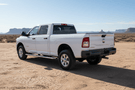 Overland Adventure Kit for a 2024 Dodge Ram 2500, engineered for extreme-duty demands with Fab Fours bumpers, Warn winch, Truxedo rack  and ARB rooftop tent.