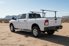 Overland Adventure Kit for a 2024 Dodge Ram 2500, engineered for extreme-duty demands with Fab Fours bumpers, Warn winch, Truxedo rack  and ARB rooftop tent.