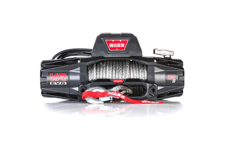 Overland Adventure Kit installed on a 2007 Chevy Silverado 2500 with Hammerhead bumpers, Warn winch, Truxedo rack and ARB roof tent built for any terrain.