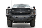 Overland Adventure Kit on 2019 Chevy Silverado 2500HD featuring Fab Fours bumpers, Warn winch, TruXedo rack, and ARB rooftop tent for off-road exploration.