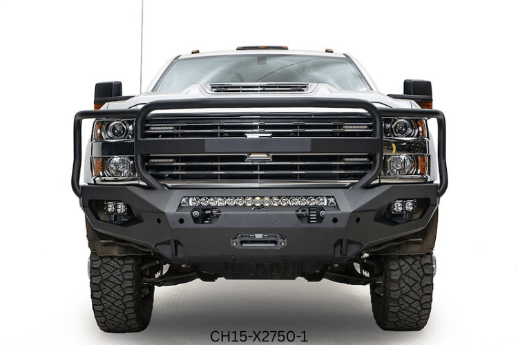 Overland Adventure Kit on 2019 Chevy Silverado 2500HD featuring Fab Fours bumpers, Warn winch, TruXedo rack, and ARB rooftop tent for off-road exploration.