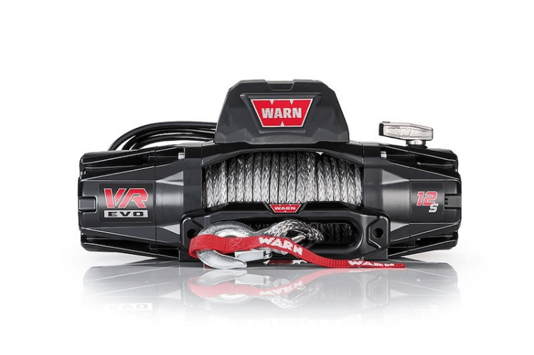 2025 Chevrolet Silverado 2500HD equipped with the Overland Adventure Kit, featuring Fab Fours front and rear bumpers, WARN VR EVO 12-S winch, TruXedo Elevate FS rack, and ARB rooftop tent for off-road adventure and cargo versatility