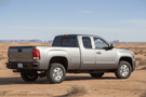 2007 GMC Sierra 2500HD Overland Adventure Kit with Hammerhead bumpers, Warn winch, TruXedo rack and, ARB Rooftop Tent.