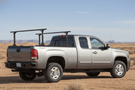 2007 GMC Sierra 2500HD Overland Adventure Kit with Hammerhead bumpers, Warn winch, TruXedo rack and, ARB Rooftop Tent.