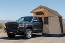 2019 GMC Sierra 2500HD Overland Adventure Kit featuring Fab Fours bumper, Warn winch, Truxedo rack and, ARB Rooftop Tent.
