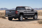 2019 GMC Sierra 2500HD Overland Adventure Kit featuring Fab Fours bumper, Warn winch, Truxedo rack and, ARB Rooftop Tent.