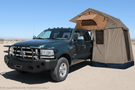 Overland Adventure Kit for a 2007 Ford F250 Superduty, engineered for extreme off-road duty with Hammerhead bumpers, Warn winch, Truxedo rack and ARB roof tent.