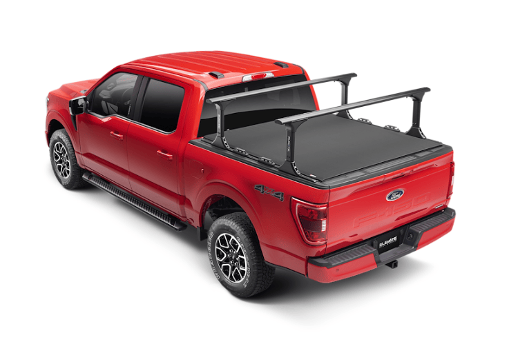 2023 F250 Superduty Overland Adventure Kit featuring Fab Fours bumpers, Warn winch, and Truxedo rack ready for off-road adventures