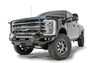 2023 F250 Superduty Overland Adventure Kit featuring Fab Fours bumpers, Warn winch, Truxedo rack and ARB roof tent ready for off-road adventures.