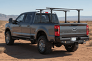 Overland Adventure Kit for a 2025 Ford F250, perfected for long-term durability with Warn & Road Armor bumpers, Warn winch, Truxedo rack and ARB rooftop tent.