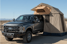 Overland Adventure Kit for a 2025 Ford F250, perfected for long-term durability with Warn & Road Armor bumpers, Warn winch, Truxedo rack and ARB rooftop tent.
