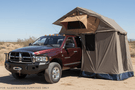 Overland Adventure Kit for a 2005 Dodge Ram 2500, optimized for maximum strength with Hammerhead bumpers, Warn winch, Truxedo rack and ARB rooftop tent.