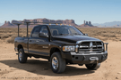 Overland Adventure Kit for a 2005 Dodge Ram 2500, optimized for maximum strength with Hammerhead bumpers, Warn winch, Truxedo rack and ARB rooftop tent.