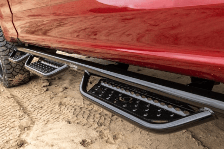 Ranch Hand Legend running steps RSD101C6B6S installed on a Dodge Ram 1500 for sturdy side access and rugged truck styling.