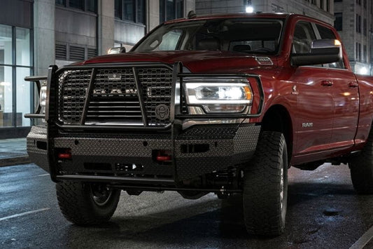 Ranch Hand FSD191BL1C Summit front bumper with sensor compatibility for 2019–2024 Ram 2500 and 3500 trucks in an urban setting