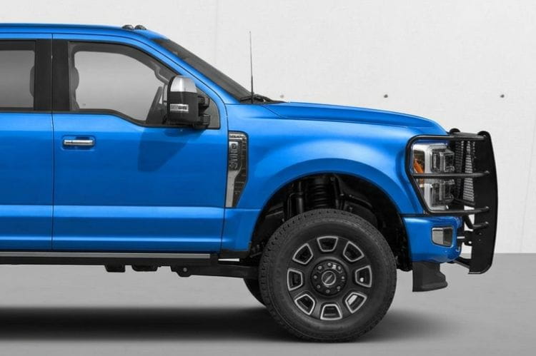 Blue pickup truck with Ranch Hand Legend Series Grille Guard for 2023-2026 Ford F250 and F350 Super Duty, heavy-duty black pipe steel