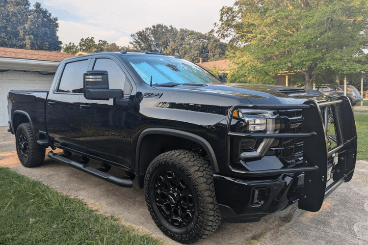 Black 2024-2026 Chevy Silverado truck with a Legend Series Grille Guard