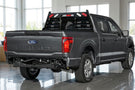 Side-view of Ranch Hand Legend Series Headache Rack with Lights for 2004-2026 Ford F150, heavy-duty black pipe steel cab protector