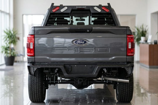 Back view of a Ford F-150 truck with Ranch Hand Legend Series Headache Rack with Lights for 2004-2026 Ford F150, heavy-duty black pipe steel cab protector