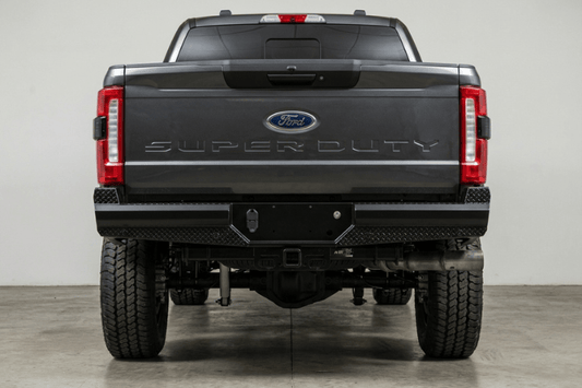 Ranch Hand BBF231BLSS Legend Series rear bumper for 2017-2026 Ford F250 and F350 Super Duty, featuring 4-inch schedule 40 pipe steel and sensor-ready mounting.