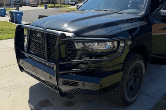 Ranch Hand Summit front bumper grille guard on Ram 1500 Rebel 2025-2026 angled front view on a driveway.