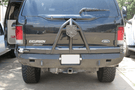 Road Armor Stealth 61208B rear bumper replacement with spare tire carrier for 1999-2007 Ford Excursion – heavy-duty back bumper with rear winch mount, textured black finish, winch-ready design