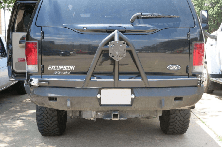 Road Armor Stealth 61208B rear bumper replacement with spare tire carrier for 1999-2007 Ford Excursion – heavy-duty back bumper with rear winch mount, textured black finish, winch-ready design