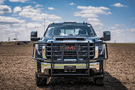 Road Armor Vaquero heavy duty brush guard front grille guard on 2020–2026 GMC Sierra 2500/3500 truck.