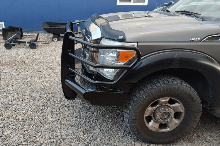 Side view of heavy-duty Steelcraft front bumper with winch ready receiver for Ford Super Duty 2011–2016