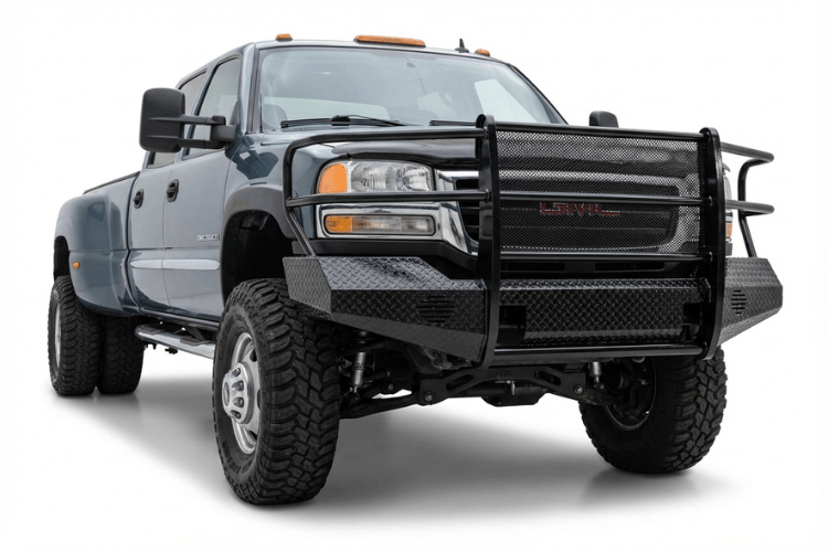 TrailFX FX3017 full replacement front bumper for 2007-2010 GMC Sierra 2500 and 3500 HD, featuring a heavy-duty grille guard and textured black powder-coat finish.