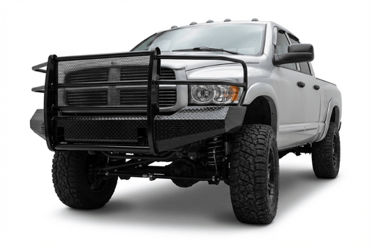 TrailFX FX3010 full replacement front bumper for 2003-2005 Dodge Ram 2500 and 3500, featuring a heavy-duty steel grille guard and textured black powder-coat finish.